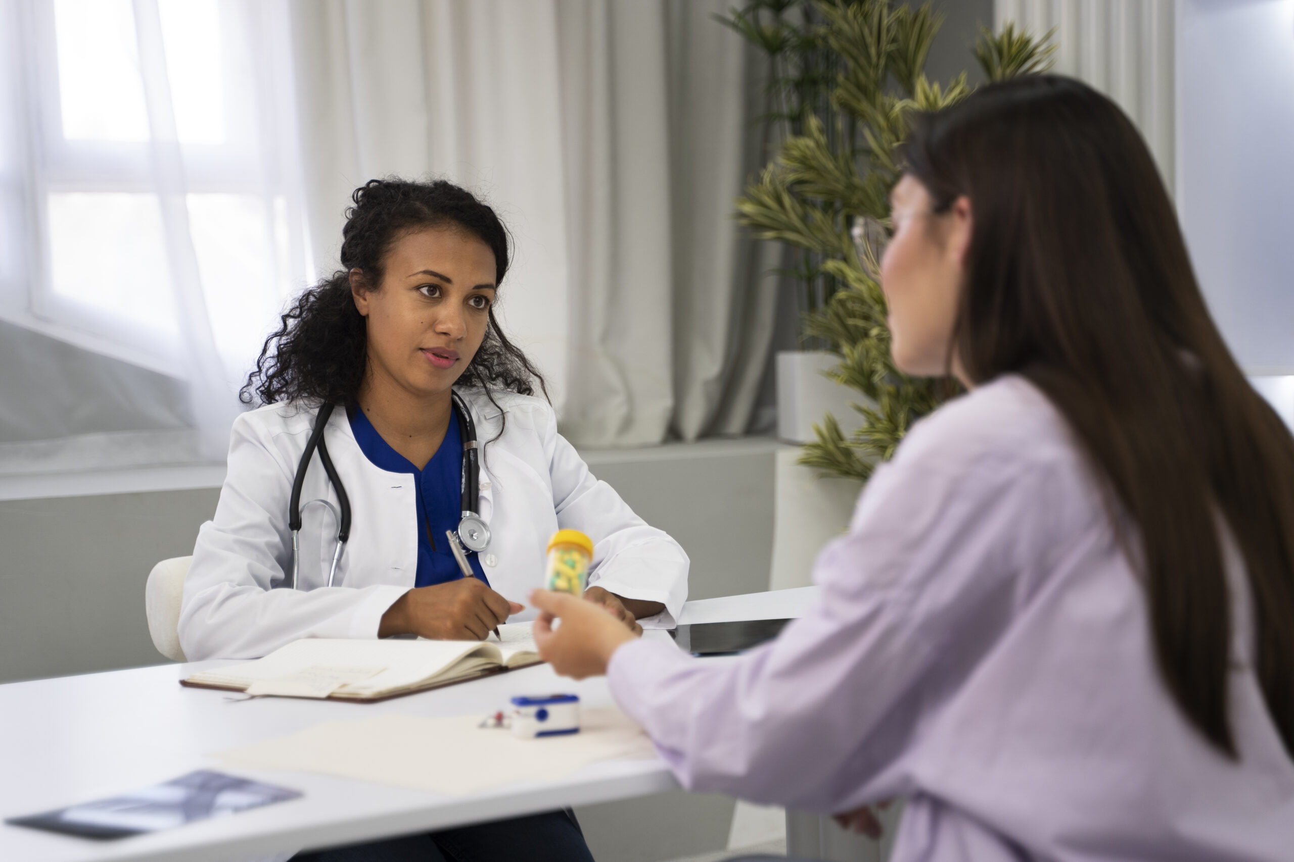 Doctor consulting a patient at a leading multi-specialty hospital in Trivandrum